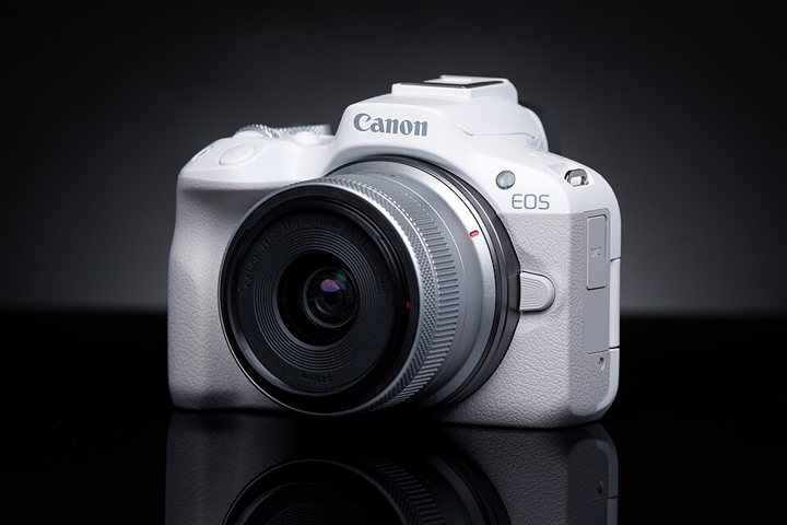 Canon EOS R50 camera with its 18–45mm kit lens attached.