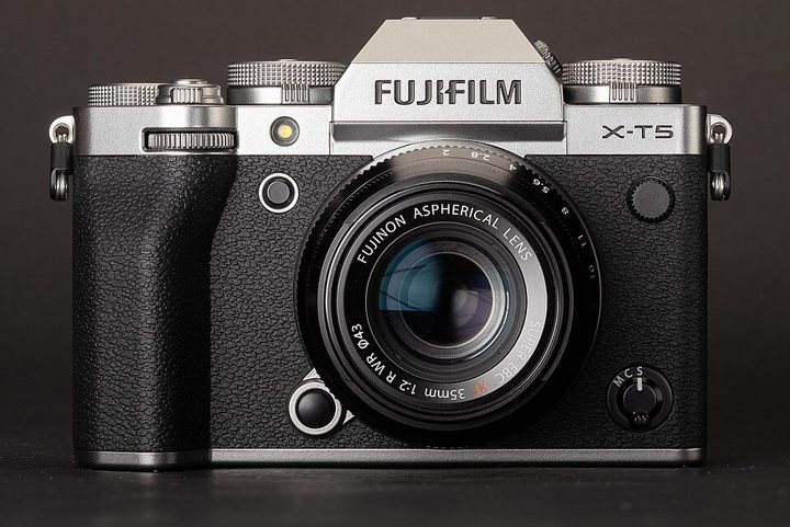 Fujifilm X-T5 mirrorless camera body with dials on the top plate.